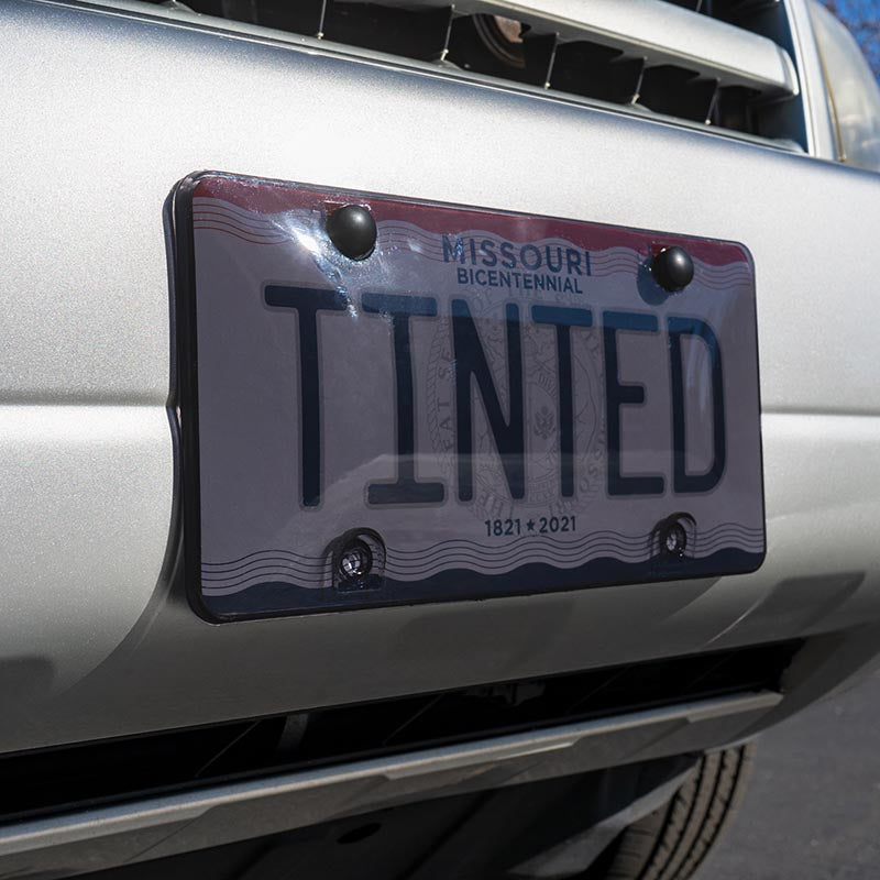 Is it legal to have a tinted license plate cover in Colorado